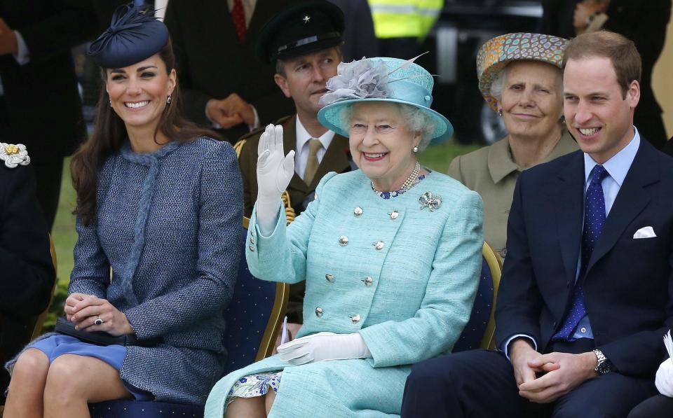 Catherine, Duchess of Cambridge, Queen Elizabeth II and Prince William, Duke of Cambridge watch part of a children's sports event while visiting Vernon Park during a Diamond Jubilee visit to Nottingham on June 13, 2012 in Nottingham, England. (Photo by Phil Noble - WPA Pool/Getty Images)