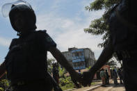 <p>Bangladeshi police cordon an area after a raid on a two-story house, seen in the background, in Narayanganj, outskirts of Dhaka, Saturday, Aug. 27, 2016. (AP Photo) </p>