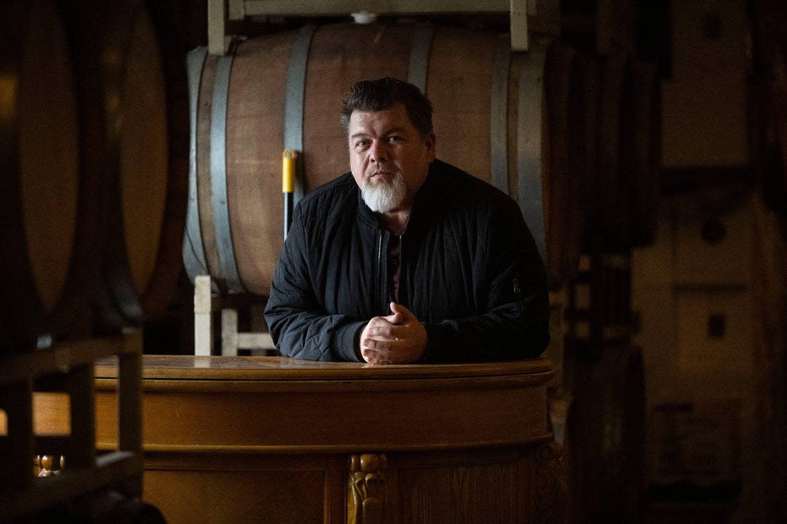 Eric Hays, owner of Chateau Davell, stands inside his wine making warehouse at his winery in Camino last month. Lezlie Sterling/lsterling@sacbee.com