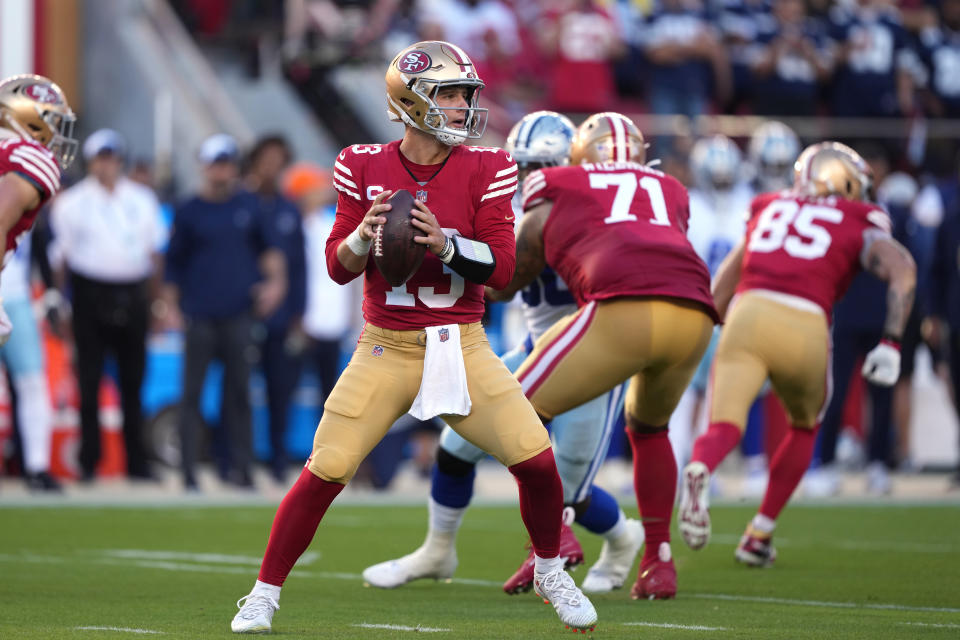 Oct 8, 2023; Santa Clara, California, USA; San Francisco 49ers quarterback Brock Purdy (13) prepares to pass against the Dallas Cowboys during the first quarter at Levi’s Stadium. Mandatory Credit: Darren Yamashita-USA TODAY Sports