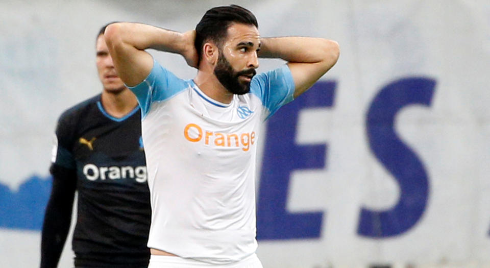 Adil Rami lost his job under truly bizarre circumstances. (REUTERS/Philippe Laurenson)