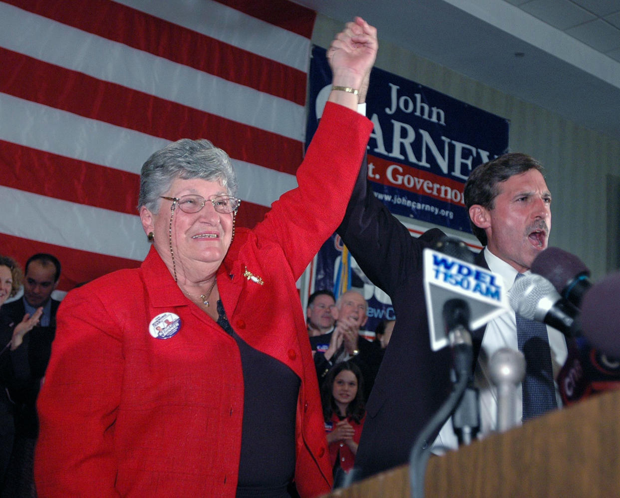 FILE - Delaware Gov. Ruth Ann Minner, left, and Lt. Gov. John Carney raise their arms in victory as they celebrate winning their respective races Tuesday, Nov. 2, 2004, in Wilmington, Del. Ann Minner, a sharecropper's daughter who became the only woman to serve as Delaware's governor, died on Nov. 4, 2021. (AP Photo/Pat Crowe II, File)