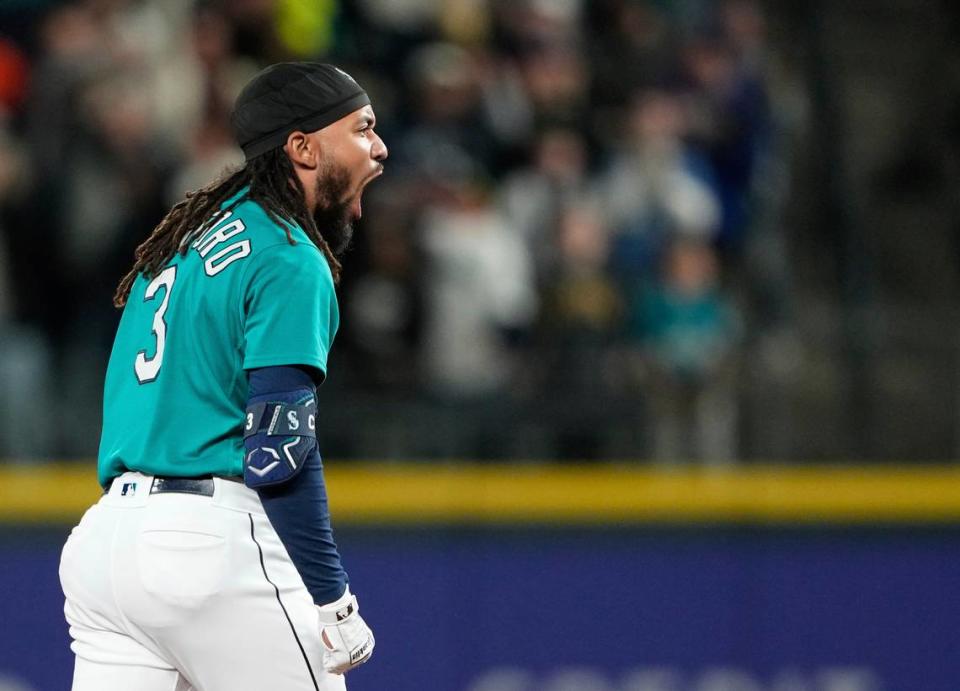 Seattle Mariners’ J.P. Crawford reacts after hitting a three-run double against the Houston Astros during the eighth inning of a baseball game Saturday, May 6, 2023, in Seattle. (AP Photo/Lindsey Wasson)