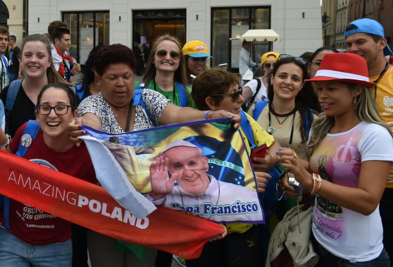 Young Catholics from around the world gather at the market square in Krakow, Poland, on July 25, 2016, before the opening of World Youth Day