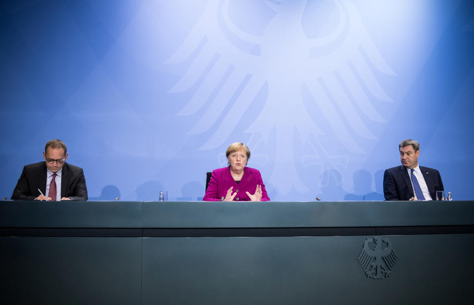 Angela Merkel, Michael Müller und Markus Söder bei der Pressekonferenz zu den Corona-Maßnahmen (Bild: Stefanie Loos/Pool via Reuters)