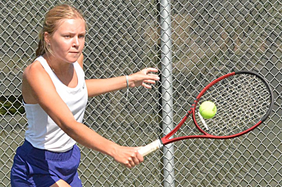 Watertown's Ellie Zink hits a backhand return during a match against Harrisburg in a high school girls tennis triangular on Tuesday, Sept. 12, 2023 at Highland Park.