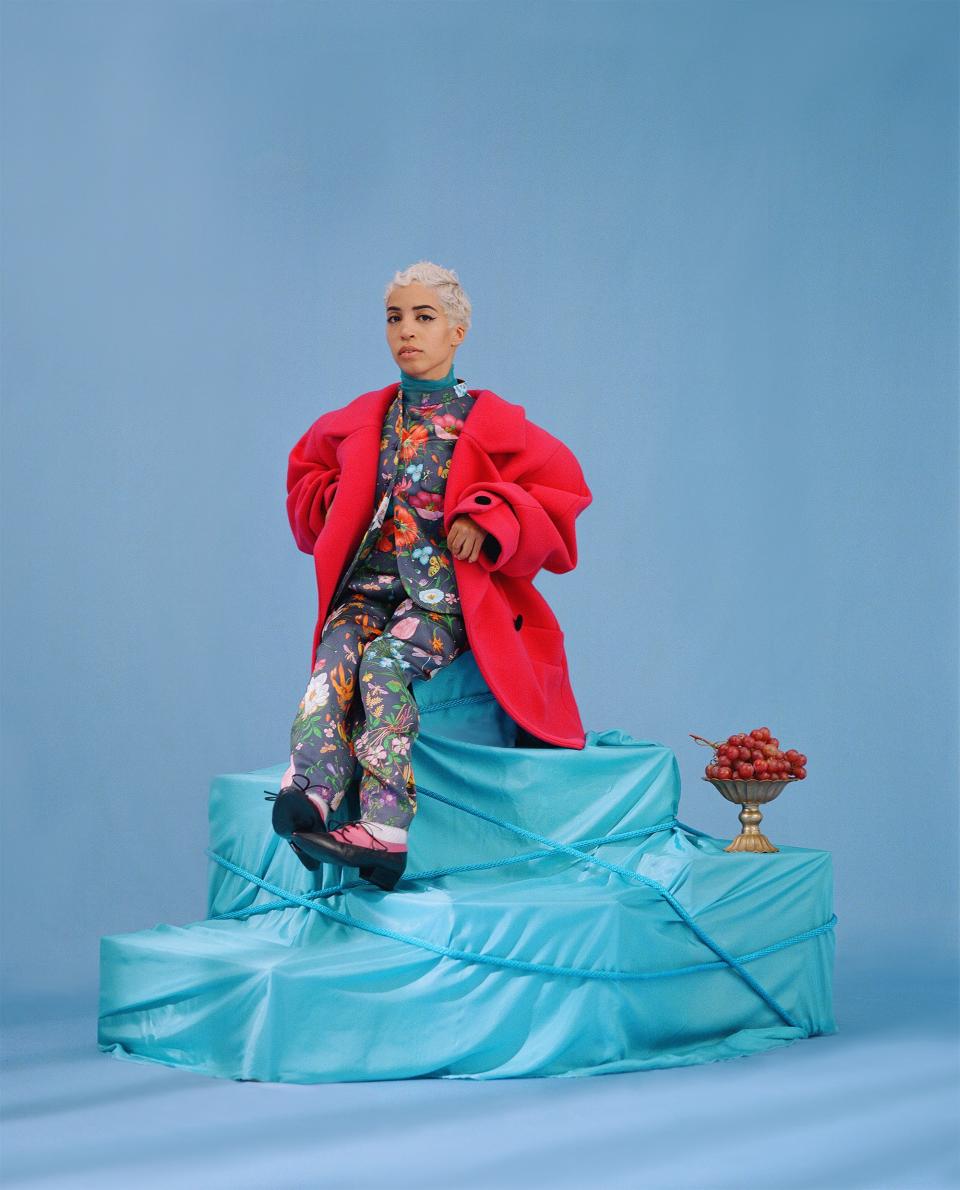 <cite class="credit">Photo by: Camila Falquez | <em><strong>Marc Jacobs Oversized Coat,</strong> Price Upon Request. Marcjacobs.com.</em> <em><strong>Jil Sander Top,</strong> $1,150. Jilsander.com.</em> <em><strong>Gucci Guru Neck Jacket,</strong> $4,500. Gucci.com.</em> <em><strong>Gucci Satin Pegged Pants,</strong> $2,900. Gucci.com.</em> <em><strong>Marc Jacobs Colorblock Oxfords,</strong> $395. Marcjacobs.com.</em> <em><strong>Miu Miu Socks,</strong> $230. Miumiu.com.</em></cite>