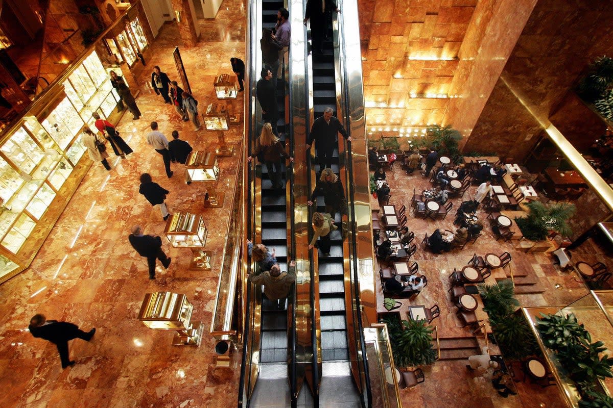 Shoppers and diners visiting Trump Tower (AFP/Getty)