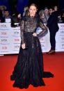 <p>Wearing a sheer lace dress. <em>[Photo: Getty]</em> </p>