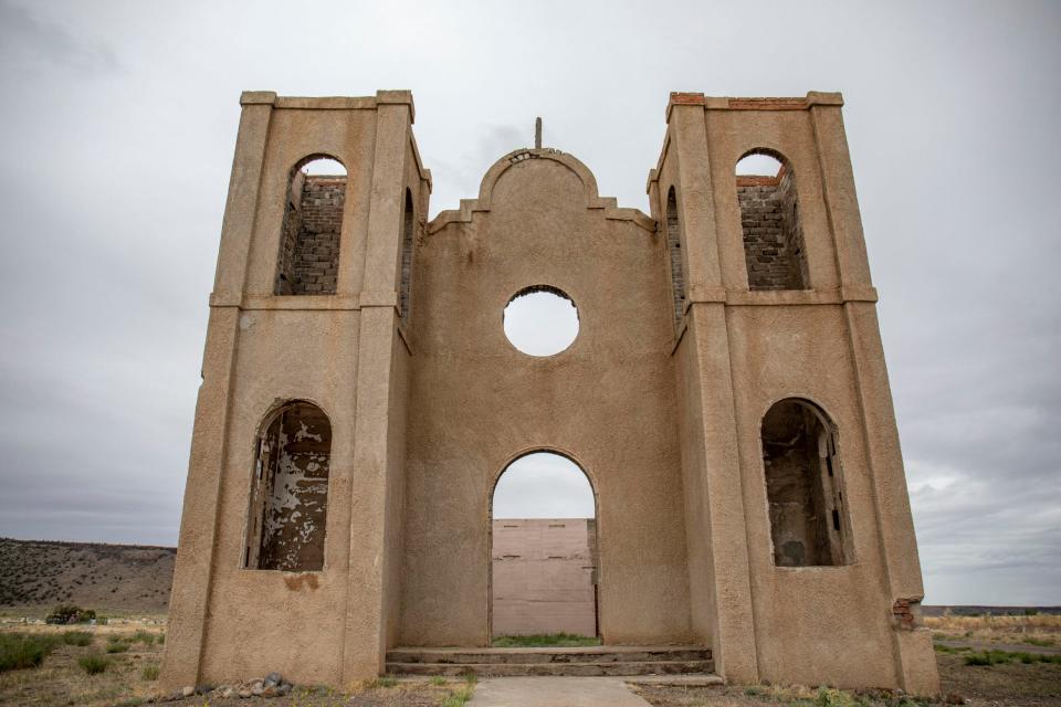 A carpet of grass fills the aisles of the church, open to the elements for nearly 50 years.