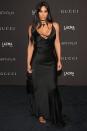 <p>In a Tom Ford for Gucci silk gown, black sandals, mini purse, and layered cross choker for the LACMA Art+Film Gala in Los Angeles. </p>