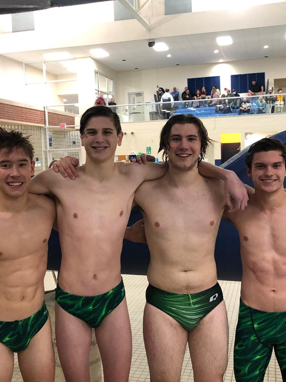 Aurora swimmers Andy Ploskunak, Cameron Good, Max Bailey and Nate New.