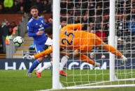Soccer Football - Premier League - Fulham v Cardiff City - Craven Cottage, London, Britain - April 27, 2019 Fulham's Sergio Rico makes a save as Cardiff City's Sean Morrison looks on REUTERS/Eddie Keogh