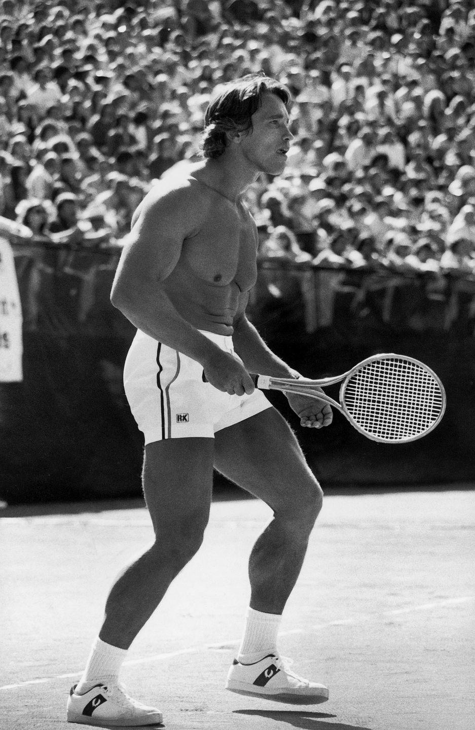 <p>Arnold Schwarzenegger plays in a celebrity tennis tournament. </p>