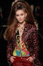 <p>There's big hair-and then there's the hair seen on the pre-fall 2019 Versace runway last night. Model Grace Elizabeth's hair was pulled into a super-high ponytail, decorated with three Versace brooches, and then pounds of fake hair were added in for the sky-high cascading effect. The look was reminiscent of the latest Valentino runway, where model Kaia Gerber stormed the catwalk in hair so voluminous you could practically see it from the ISS.</p>