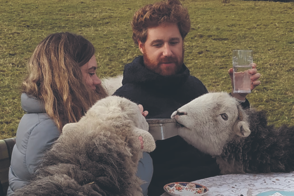 Scotland’s most eccentric retreat? Adam and Julia feeding Beccy’s pet sheep during the therapy experience