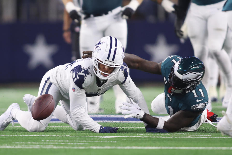 Dec 10, 2023; Arlington, Texas, USA; Philadelphia Eagles wide receiver <a class="link " href="https://sports.yahoo.com/nfl/players/31883" data-i13n="sec:content-canvas;subsec:anchor_text;elm:context_link" data-ylk="slk:A.J. Brown;sec:content-canvas;subsec:anchor_text;elm:context_link;itc:0">A.J. Brown</a> (11) fumbles the ball after being tackled by Dallas Cowboys cornerback Stephon Gilmore (21) in the second half at AT&T Stadium. Mandatory Credit: Tim Heitman-USA TODAY Sports