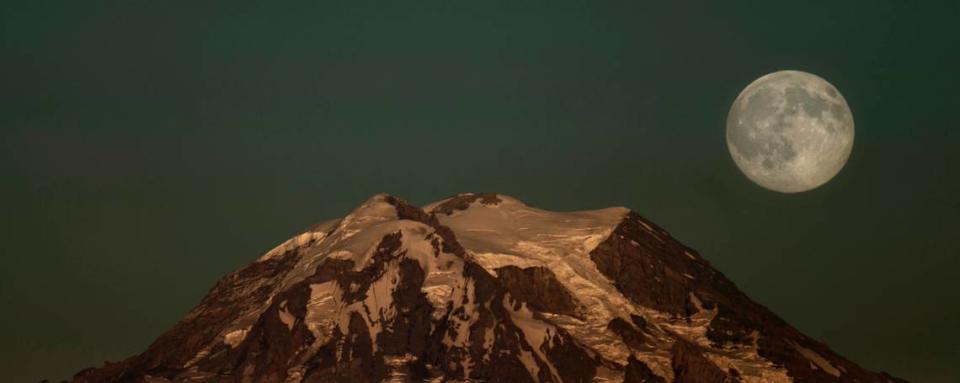 A blue moon rising over Mount Rainier in Washington in 2015.