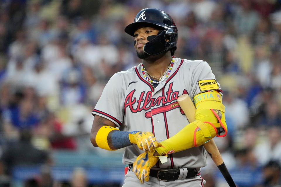 Atlanta Braves' Ronald Acuna Jr. gets set to bat during the first inning of a baseball game against the Los Angeles Dodgers Thursday, Aug. 31, 2023, in Los Angeles. (AP Photo/Mark J. Terrill)