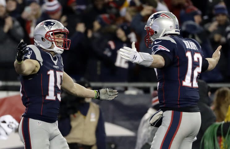 Chris Hogan, who had 180 yards in the AFC championship game, celebrates with Tom Brady. (AP)