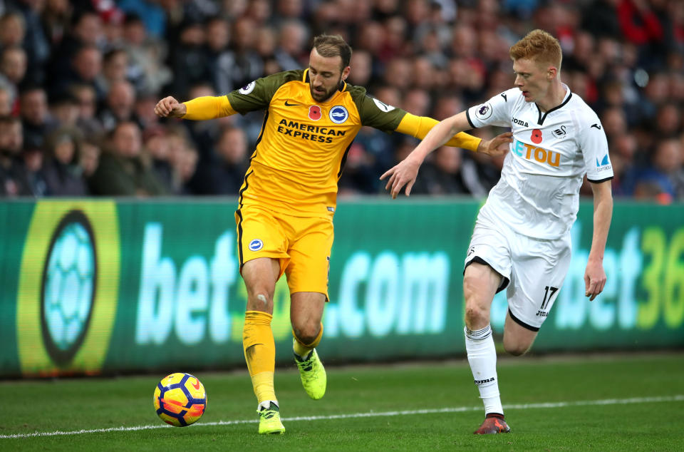 Man in form: Glenn Murray in action for Brighton at Swansea City – a game in which he won for the Albion
