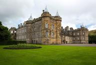 <p>The Edinburgh palace is where the Queen stays during her visits to Scotland, typically the first week of the summer. It was originally founded as a monastery in 1128.</p><p><a rel="nofollow noopener" href="https://www.tripadvisor.com/Attraction_Review-g186525-d213542-Reviews-Palace_of_Holyroodhouse-Edinburgh_Scotland.html" target="_blank" data-ylk="slk:More Info;elm:context_link;itc:0;sec:content-canvas" class="link ">More Info</a> <em>Holyrood Palace, Edinburgh, Scotland</em><br></p>