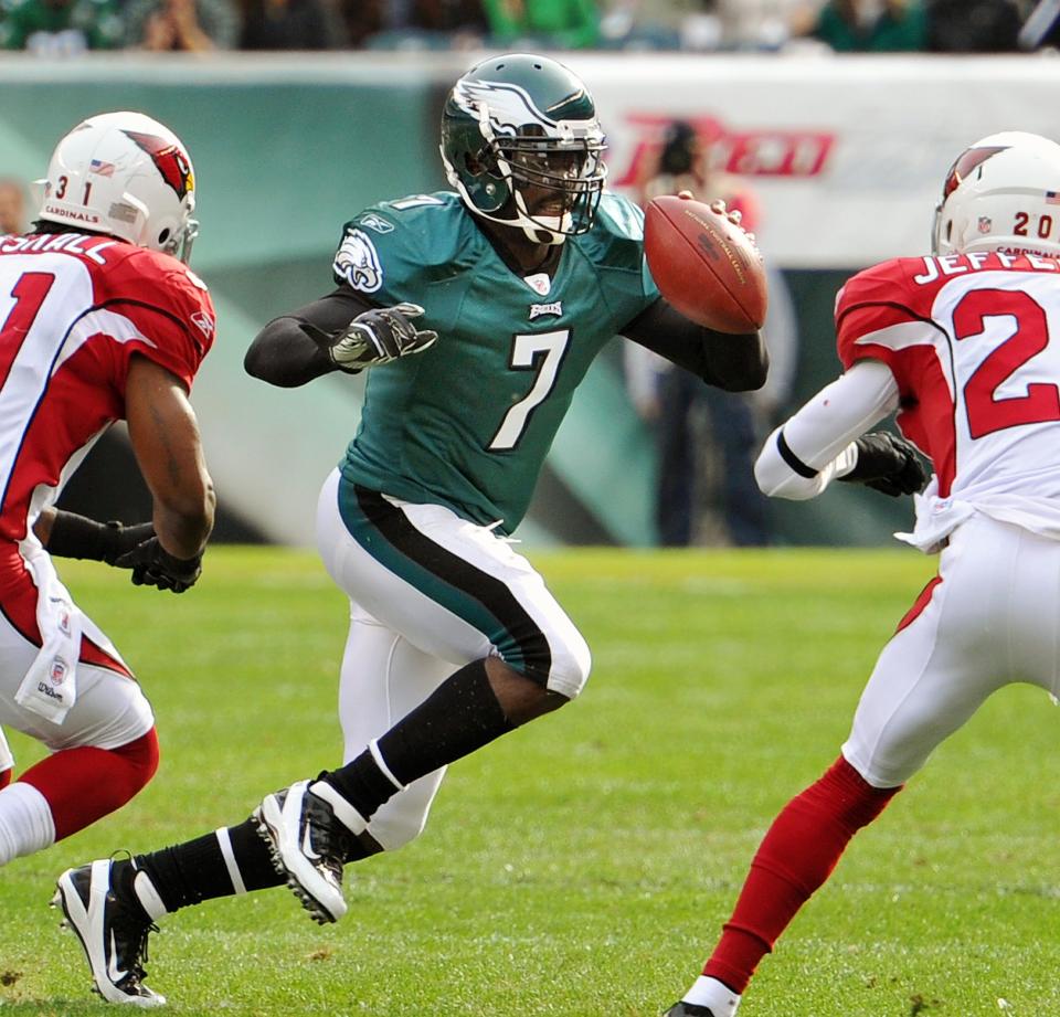 Philadelphia Eagles quarterback Michael Vick (7) scrambles out of the pocket against the Arizona Cardinals during first quarter action at Lincoln Financial Field on November 13, 2011.