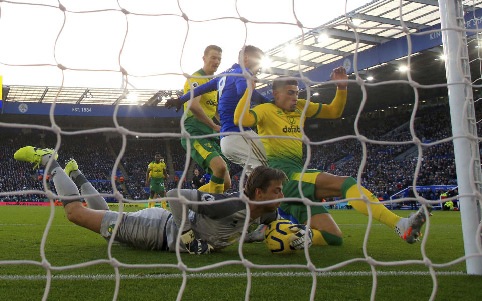 Norwich City goalkeeper Tim Krul makes a save during the match against Leicester City, during their English Premier League soccer match at King Power Stadium in Leicester, England, Saturday Dec. 14, 2019. (Nick Potts/PA via AP)