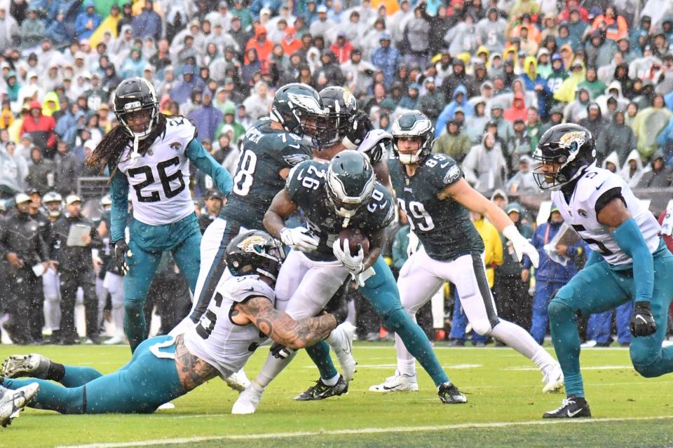 Oct 2, 2022; Philadelphia, Pennsylvania, USA; Philadelphia Eagles running back Miles Sanders (26) scores a touchdown during the fourth quarter against the Jacksonville Jaguars at Lincoln Financial Field. Mandatory Credit: Eric Hartline-USA TODAY Sports