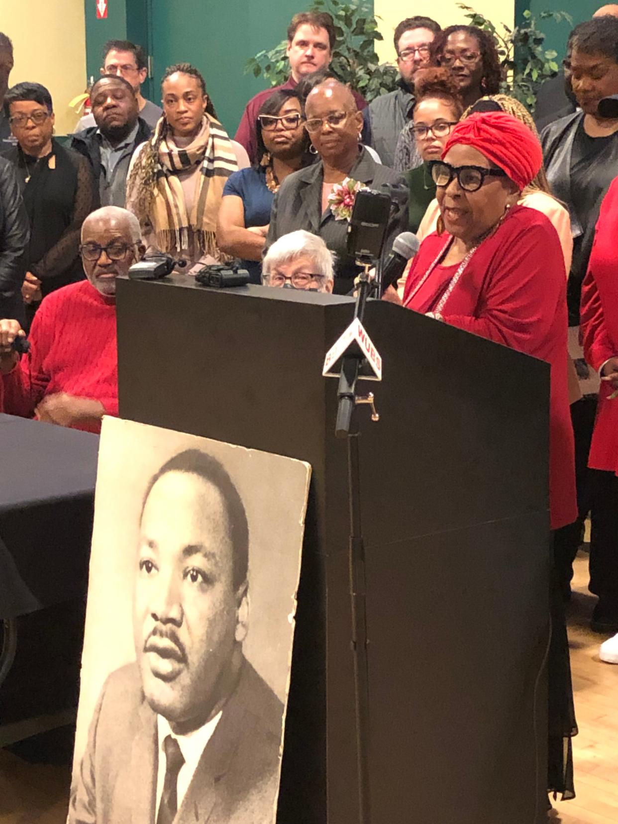 Gladys Muhammad speaks at the podium along with fellow organizers of the 2024 Martin Luther King Jr. holiday celebrations in South Bend as they announce their events on Wednesday, Jan. 3, 2024, in the Charles Martin Youth Center.