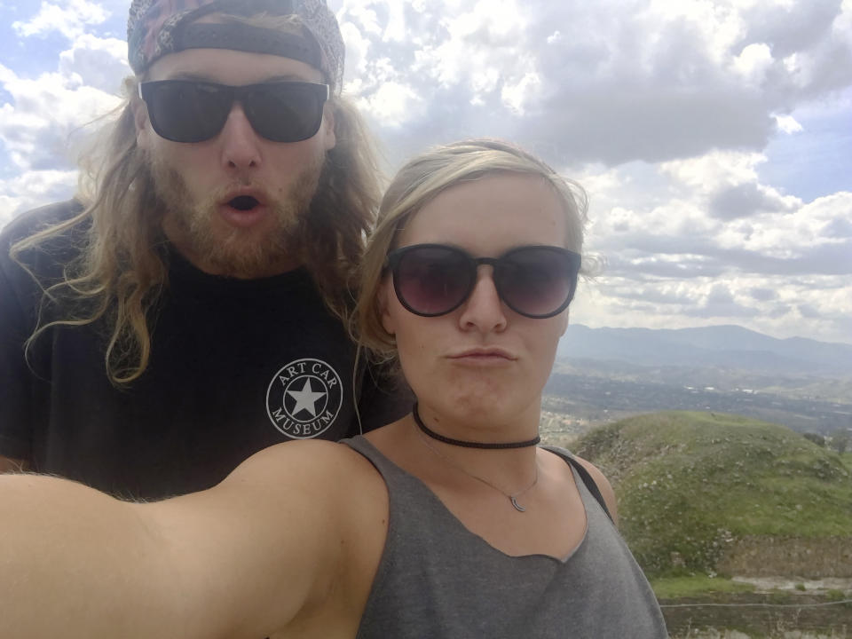 In this undated photo provided by the Deese family of Chynna Deese, 23-year-old Australian Lucas Fowler, left, and 24-year-old American girlfriend Chynna Deese poses for a selfie. The couple were found murdered along the Alaska Highway near Liard Hot Springs, Canada, on Monday, July 15, 2019. (Deese Family via AP)