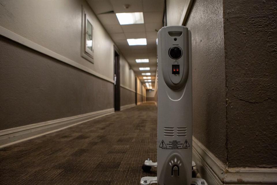 One space heater has been put in place to heat the entire hallway, which residents say isn't nearly enough to ward off frigid temperatures