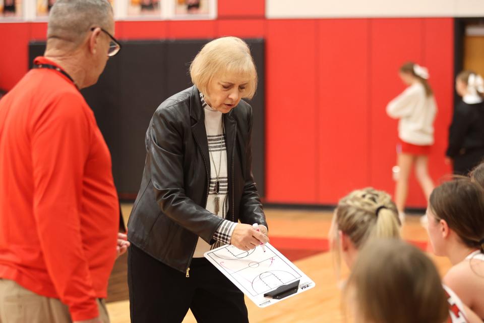 Groom’s Head Coach Betsy Baughman draws up a play for her team in a District 2-1A game against Claude, Tuesday, January 10, 2023, at Groom High School Gym in Groom. Claude won 50-36.