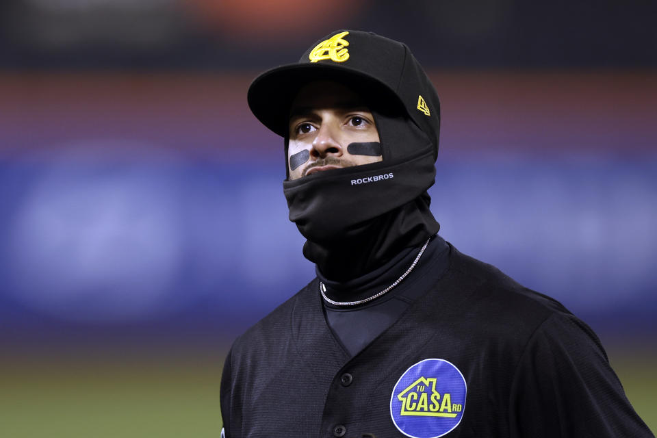 Águilas Cibaeñas' Ramon Torres warms up before a Dominican Winter League baseball game against Los Tigres del Licey, Friday, Nov. 10, 2023, in New York. (AP Photo/Adam Hunger)