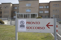 A sign attached on the indication for Emergency of the hospital of Codogno, near Lodi in Northern Italy, advises that access is not allowed Friday, Feb. 21,2020. Health officials reported the country's first cases of contagion of COVID-19 in people who had not been in China. The hospital in Codogno is one of the hospitals - along with specialized Sacco Hospital in Milan - which is hosting the infected persons and the people that were in contact with them and are being isolated. (AP Photo/Luca Bruno)