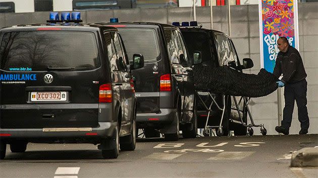 A body bag is removed from the Maelbeek metro in Brussels. Photo: Getty Images