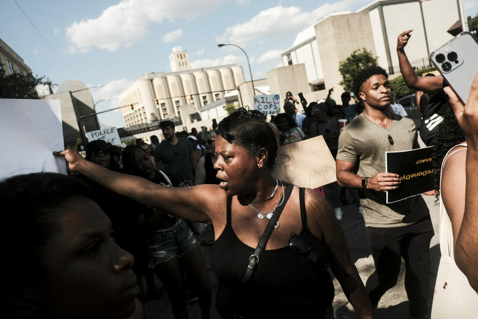Image: Demonstrators gather outside Akron City Hall to protest the killing of Jayland Walker, shot by police on July 3, 2022 in Akron, Ohio. (Matthew Hatcher / AFP via Getty Images file)