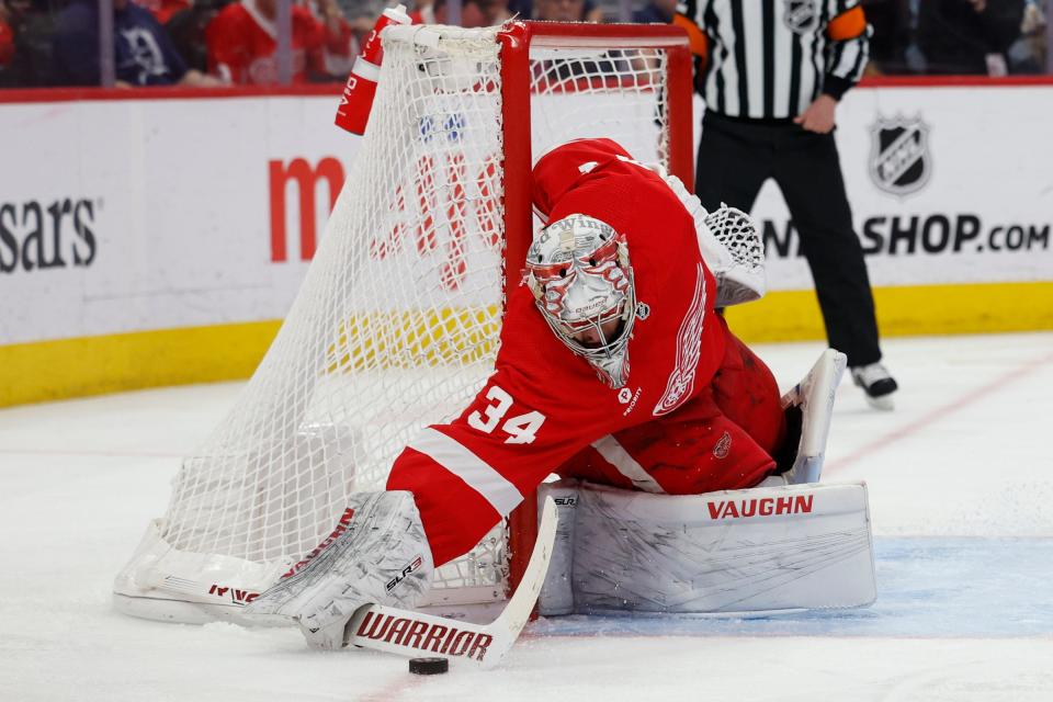 Red Wings goaltender Alex Lyon makes a save in the third period of the Wings' 2-1 loss to the Capitals on Tuesday, April 9, 2024, at Little Caesars Arena.