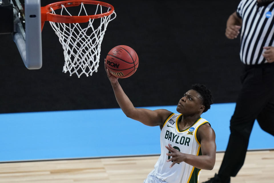 Baylor guard Moon Ursin drives to the basket during the second half of a college basketball game against Jackson State in the first round of the women's NCAA tournament at the Alamodome, Sunday, March 21, 2021, in San Antonio. (AP Photo/Eric Gay)