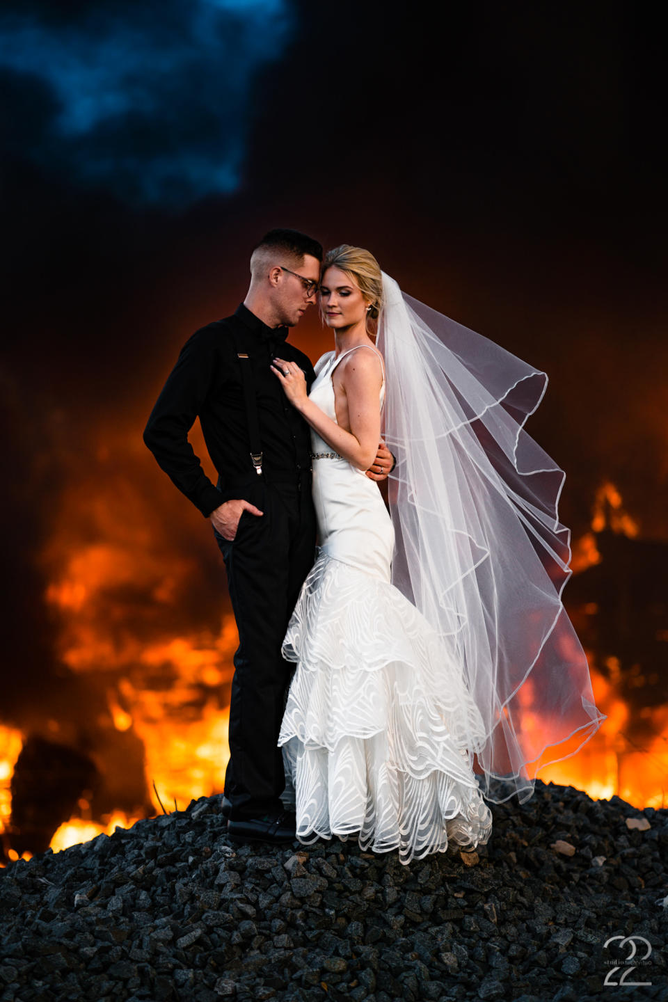 Dillon and Corrie Jameson pose for breathtaking photos with a flaming background. (Photo: Studio 22 Photography, Destination Wedding and Engagement Photographer)