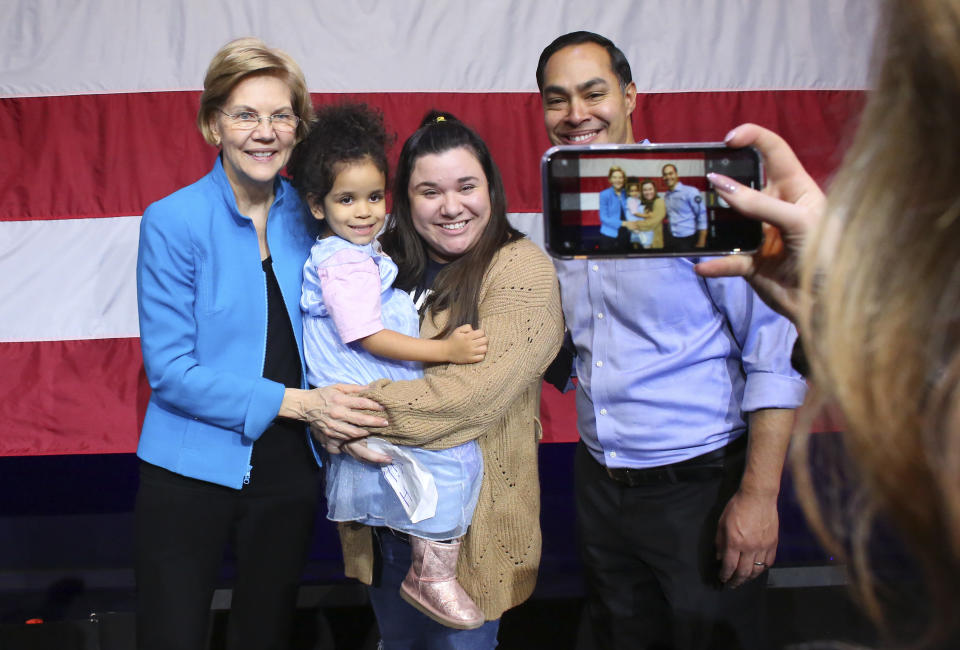 Sen. Elizabeth Warren and Julian Castro pose for selfies with her followers during a rally on January 7, 2020 in New York City. After dropping out of the presidential race, former HUD Secretary Julian Castro endorsed Senator Warren for president. (Photo: Kena Betancur/Getty Images)