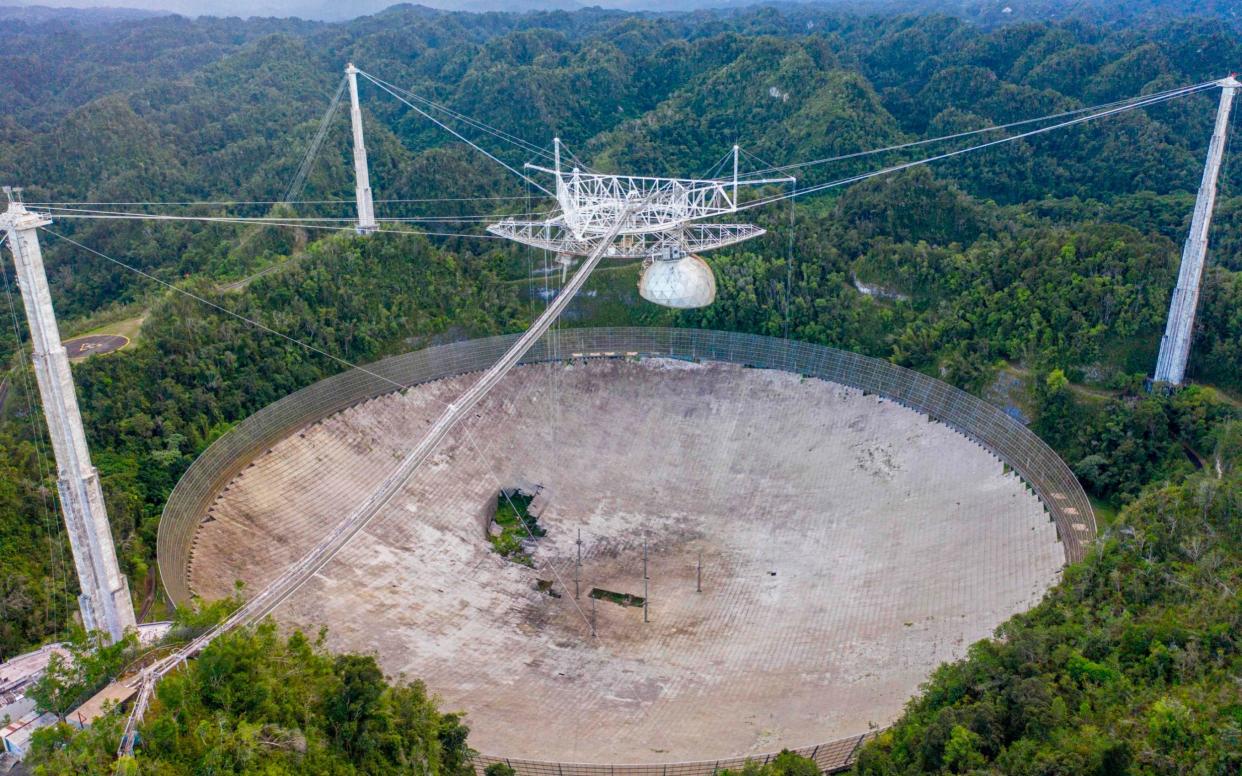 There is now a hole in the dish panels of the Arecibo Observatory - RICARDO ARDUENGO /AFP