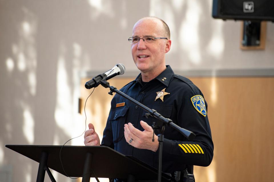 Salem Police Chief Trevor Womack speaks during a gun violence forum Friday night.