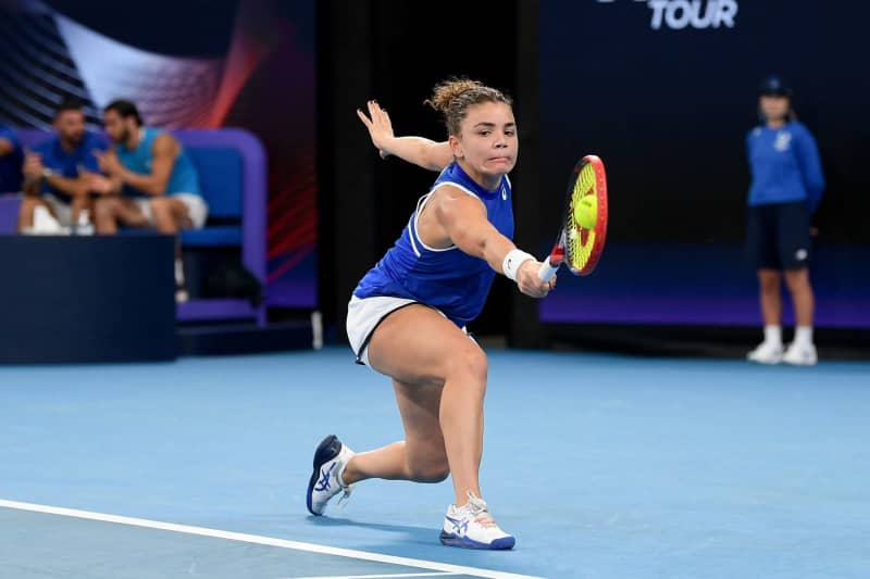 Italian tennis player Jasmine Paolini in action against Germany's Angelique Kerber during the Group D women's tennis match of the 2024 United Cup at Ken Rosewall Arena in Sydney. Steven Markham/AAP/dpa