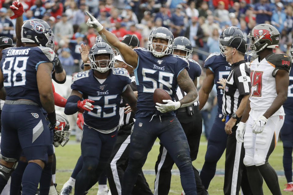 Tennessee Titans linebacker Harold Landry (58) celebrates after recovering a fumble against the Tampa Bay Buccaneers in the fourth quarter of an NFL football game Sunday, Oct. 27, 2019, in Nashville, Tenn. The Titans won 27-23. (AP Photo/James Kenney)