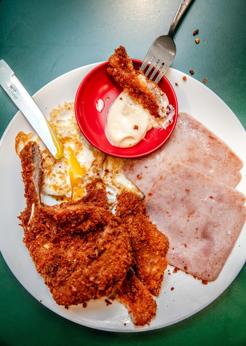 The glorious fried pork chop with ham and eggs at Lido Restaurant.