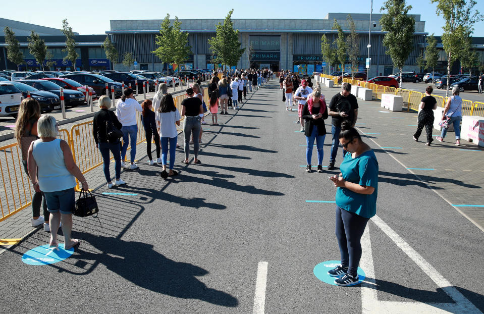 Queues form at Primark at the Rushden Lakes shopping complex on Monday.