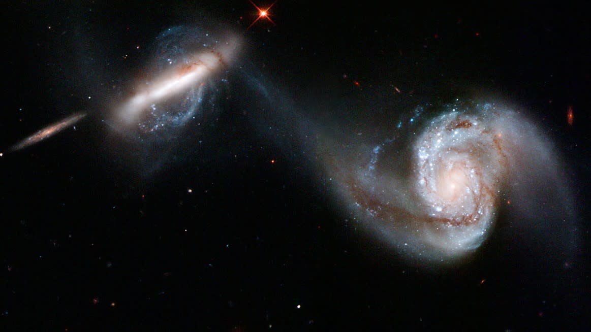  An image of two colliding galaxies as seen by the Hubble Space Telescope. 