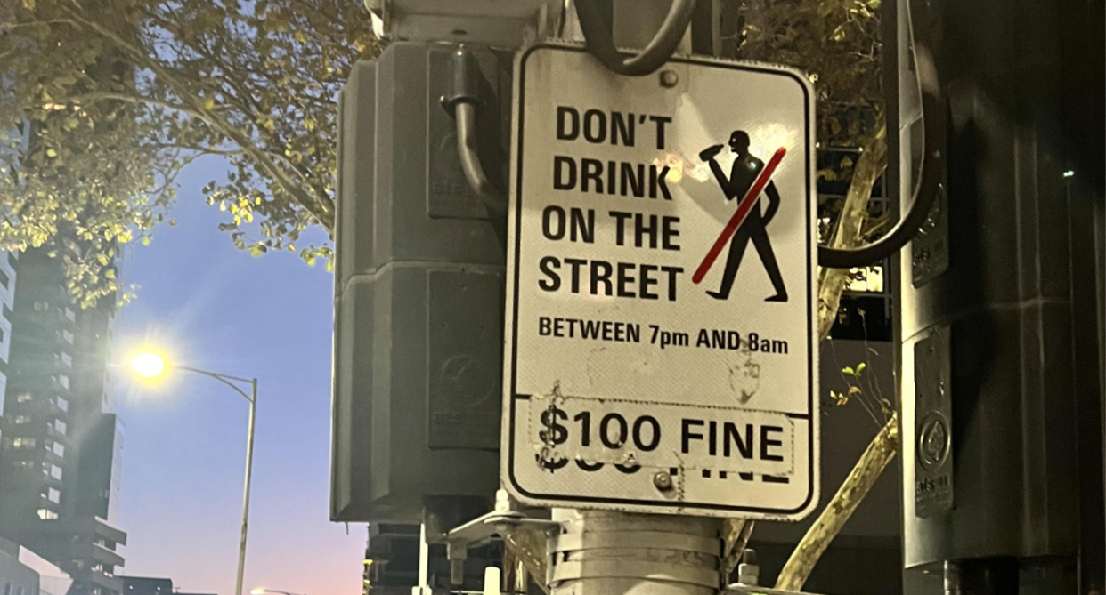 A street sign in Melbourne's CBD appearing to suggest drinking was prohibited between 7pm and 8am.