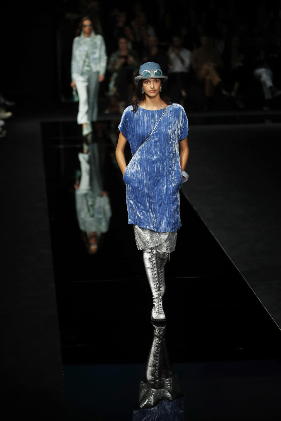 A model wears a creation as part of the Emporio Armani Spring-Summer 2020 collection, unveiled during the fashion week, in Milan, Italy, Thursday, Sept. 19, 2019. (AP Photo/Antonio Calanni)